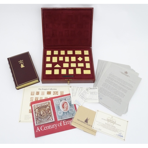 512 - The Empire Collection - A limited edition set of silver gilt replicas of British Empire postal stamp... 