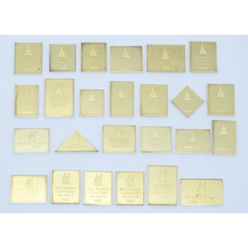 512 - The Empire Collection - A limited edition set of silver gilt replicas of British Empire postal stamp... 