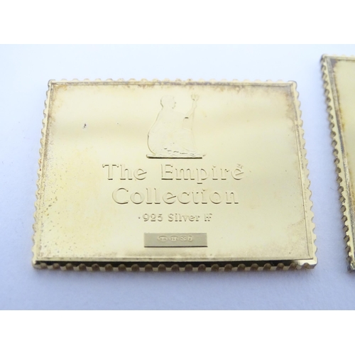 512 - The Empire Collection - A limited edition set of silver gilt replicas of British Empire postal stamp... 