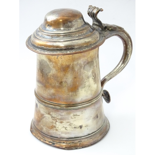 524 - An Old Sheffield Plate lidded tankard with loop handle. Approx. 8 1/2