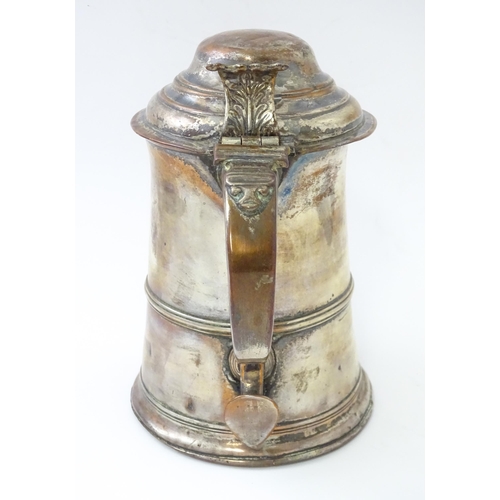 524 - An Old Sheffield Plate lidded tankard with loop handle. Approx. 8 1/2