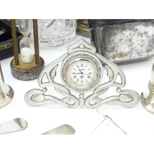 526 - A quantity of silver plate items to include tankards, cruets, cigarette case, match book case, clock... 