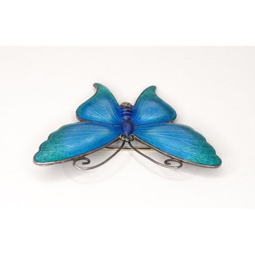 586 - A white metal brooch of butterfly form with guilloche enamel decoration, maker John Atkins & Sons. N... 