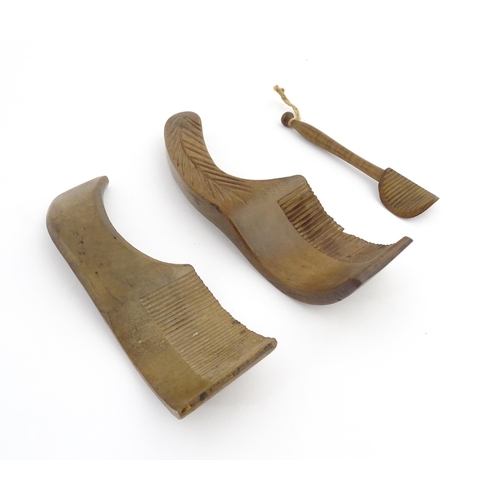 1159 - Treen : Two 19thC sycamore butter curlers having ribbed blades, one with carved foliate detail to ha... 