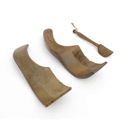 1159 - Treen : Two 19thC sycamore butter curlers having ribbed blades, one with carved foliate detail to ha... 