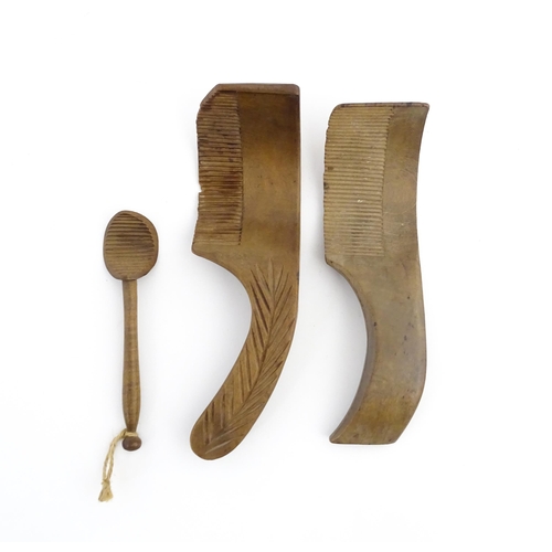 1159 - Treen : Two 19thC sycamore butter curlers having ribbed blades, one with carved foliate detail to ha... 