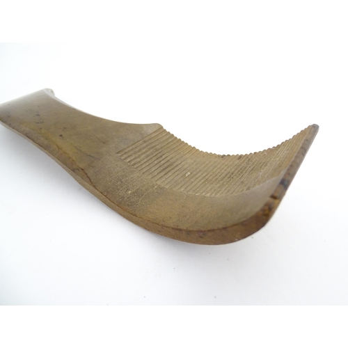 1159 - Treen : Two 19thC sycamore butter curlers having ribbed blades, one with carved foliate detail to ha... 