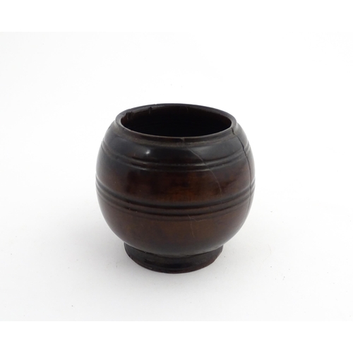 1164 - Treen : A 18th / 19thC turned wooden ointment container. Approx. 2 3/4