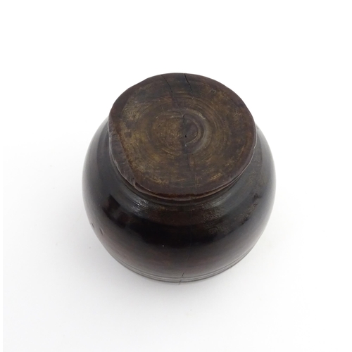 1164 - Treen : A 18th / 19thC turned wooden ointment container. Approx. 2 3/4