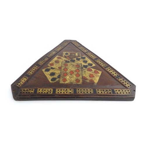 1165 - Treen : A 19thC mahogany cribbage board of triangular form with painted folk art playing card detail... 