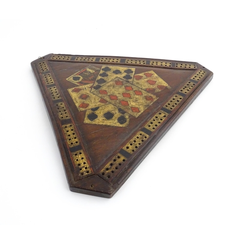 1165 - Treen : A 19thC mahogany cribbage board of triangular form with painted folk art playing card detail... 