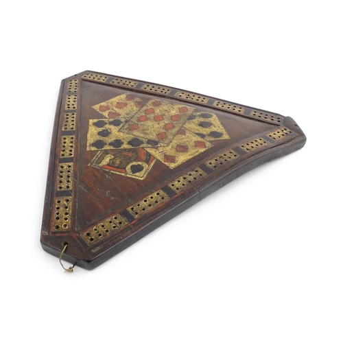 1165 - Treen : A 19thC mahogany cribbage board of triangular form with painted folk art playing card detail... 