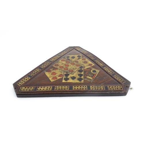 1165 - Treen : A 19thC mahogany cribbage board of triangular form with painted folk art playing card detail... 