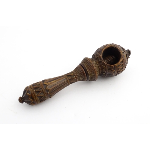 1167 - Treen : A 19thC nutcracker with chip carved decoration, with carved initials R.I.G. to reverse. Appr... 