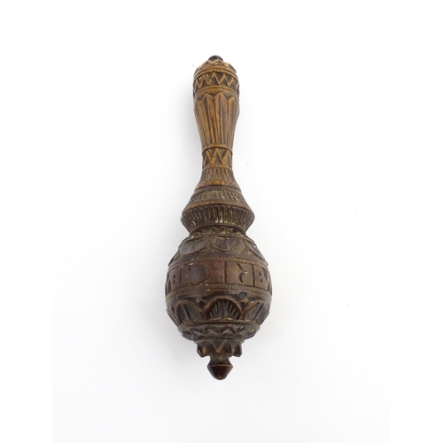 1167 - Treen : A 19thC nutcracker with chip carved decoration, with carved initials R.I.G. to reverse. Appr... 