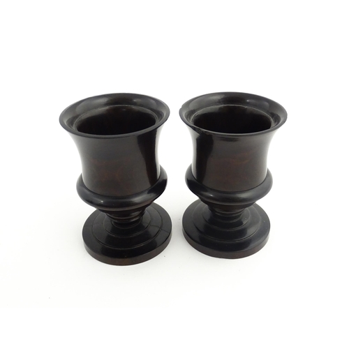 1170 - Treen : A pair of 19thC turned rosewood pedestal salts. Approx. 3