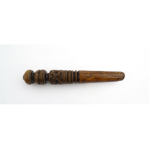 1175 - Treen : Two 18thC turned boxwood apple corers / cheese scoops, one with carved banded and floral dec... 