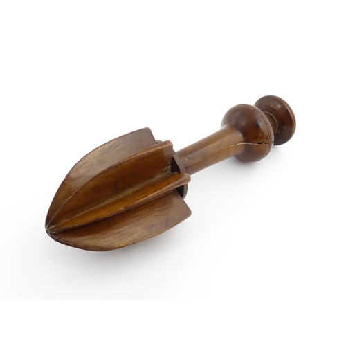 1178 - Treen : A late 18th / early 19thC turned boxwood lemon squeezer of unusual form. From the A. J. Levi... 