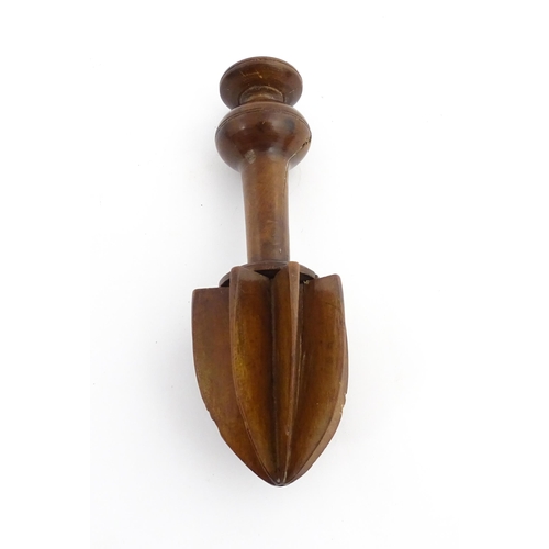 1178 - Treen : A late 18th / early 19thC turned boxwood lemon squeezer of unusual form. From the A. J. Levi... 