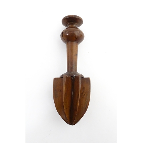 1178 - Treen : A late 18th / early 19thC turned boxwood lemon squeezer of unusual form. From the A. J. Levi... 