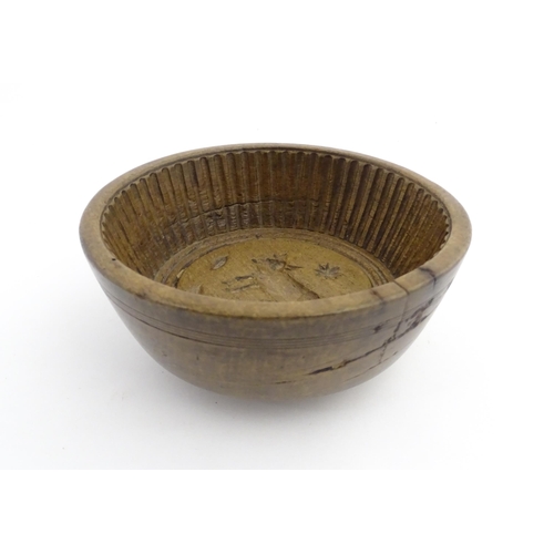 1180 - Treen : A 19thC sycamore flummery / pudding bowl / mould of circular form, having an interior with v... 