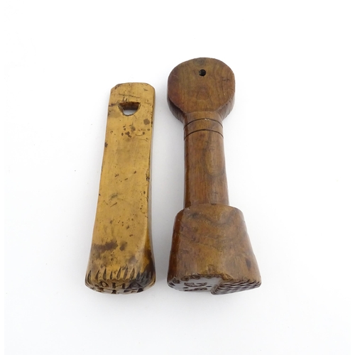 1182 - Treen : Two late 19th / early 20thC carved butter stamps, both decorated with initials, one dated 19... 