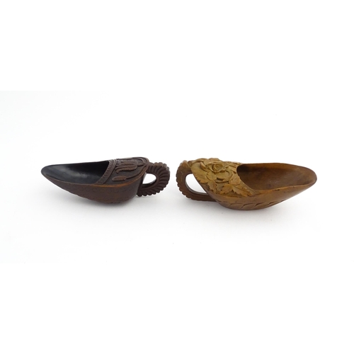 1183 - Treen : Two 19thC treen pap boats with carved floral and foliate decoration. Largest approx. 5 1/2