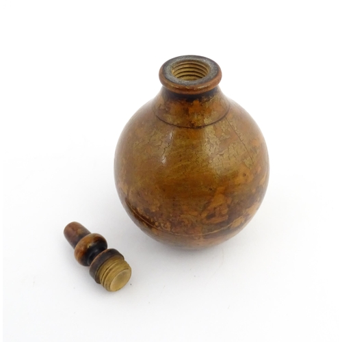 1184 - Treen : A 19thC treen spice flask shaped form, the acorn finial unscrewing to reveal a five hole sha... 