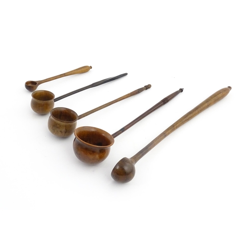 1188 - Treen : Five assorted treen cordial spoons / ladles, etc. Largest approx. 10