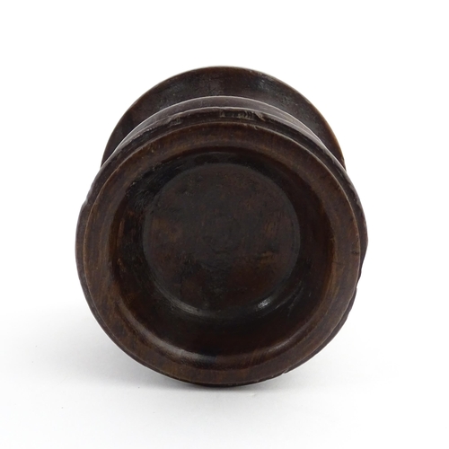 1189 - Treen : An 18thC turned wooden pedestal salt of squat form. From the P. B. Wacher Collection, label ... 