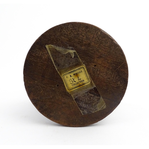 1189 - Treen : An 18thC turned wooden pedestal salt of squat form. From the P. B. Wacher Collection, label ... 