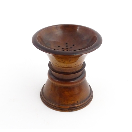 1190 - Treen : An 18thC turned boxwood pounce pot of waisted form. Approx. 2 3/4