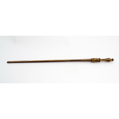 1193 - Treen : A late 18th / early 19thC mahogany ell rule / measuring stick with turned handle and parquet... 