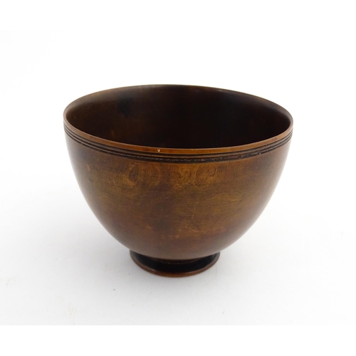 1194 - Treen : A small 19thC footed drinking bowl. From the A. J. Levi Collection, no. 631, label under. Ap... 