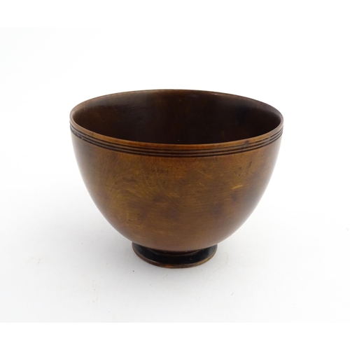 1194 - Treen : A small 19thC footed drinking bowl. From the A. J. Levi Collection, no. 631, label under. Ap... 