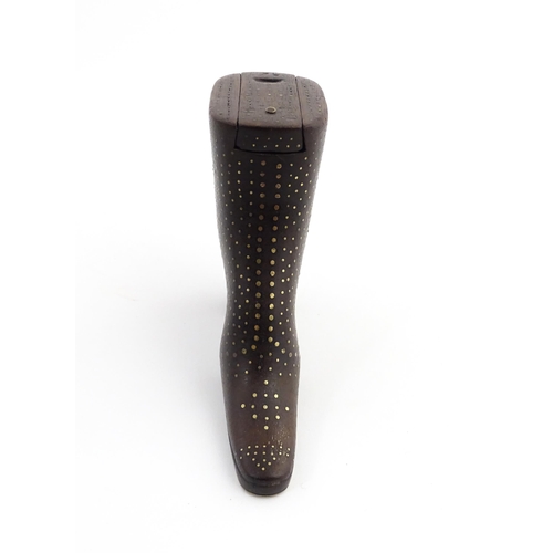 1197 - Treen : A carved shoe snuff box modelled as a heeled boot with sliding top and inlaid brass detail. ... 