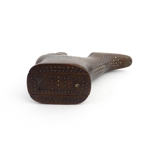 1197 - Treen : A carved shoe snuff box modelled as a heeled boot with sliding top and inlaid brass detail. ... 