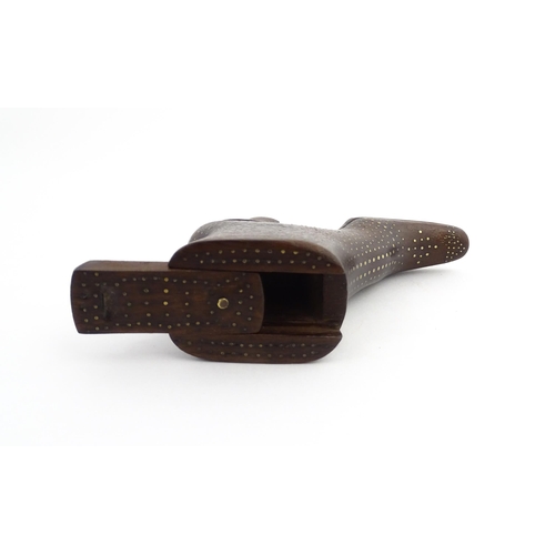 1197 - Treen : A carved shoe snuff box modelled as a heeled boot with sliding top and inlaid brass detail. ... 