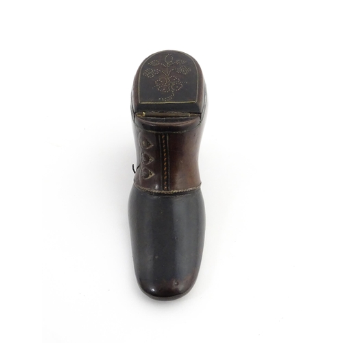 1198 - Treen : A carved snuff box modelled as a  heeled shoe with hinged lid and inlaid brass detail. Appro... 