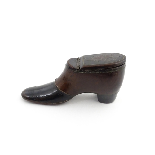 1198 - Treen : A carved snuff box modelled as a  heeled shoe with hinged lid and inlaid brass detail. Appro... 