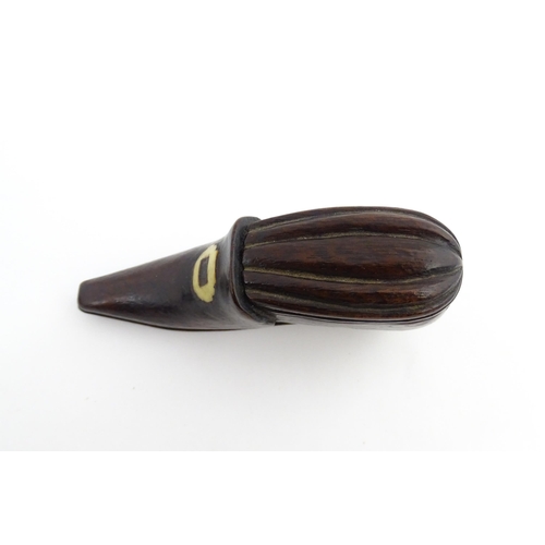 1201 - Treen : A 19thC snuff box modelled as a shoe with sliding top and carved detail. Approx. 3 1/2