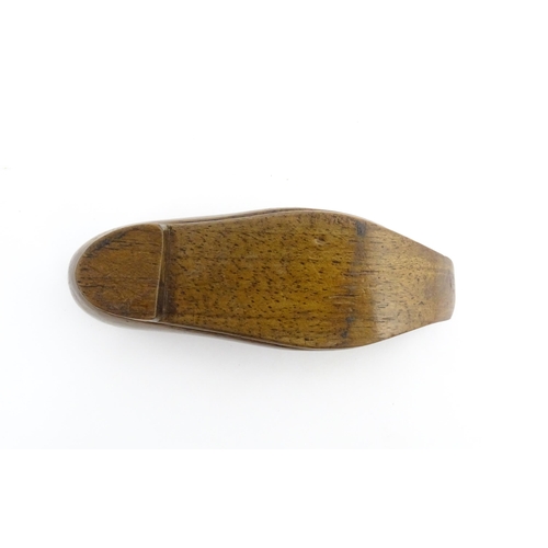 1202 - Treen : A 19thC Dutch novelty puzzle snuff box modelled as a shoe with carved decoration. Approx. 3 ... 