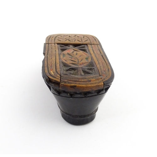 1206 - Treen : A 19thC Continental shoe snuff box with sliding top, chip carved decoration and painted deta... 