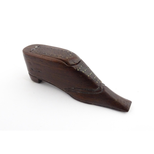 1208 - Treen : A 19thC shoe snuff box with sliding top and inlaid brass detail. Approx. 3