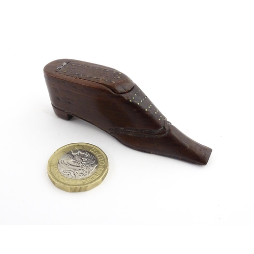 1208 - Treen : A 19thC shoe snuff box with sliding top and inlaid brass detail. Approx. 3