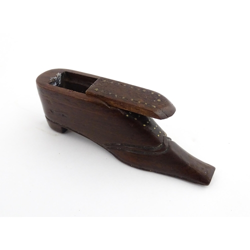 1208 - Treen : A 19thC shoe snuff box with sliding top and inlaid brass detail. Approx. 3