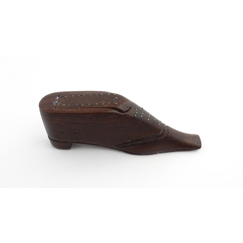 1208 - Treen : A 19thC shoe snuff box with sliding top and inlaid brass detail. Approx. 3