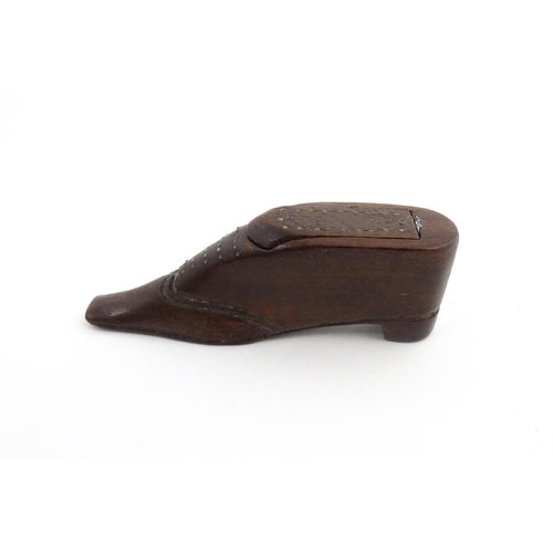 1208 - Treen : A 19thC shoe snuff box with sliding top and inlaid brass detail. Approx. 3