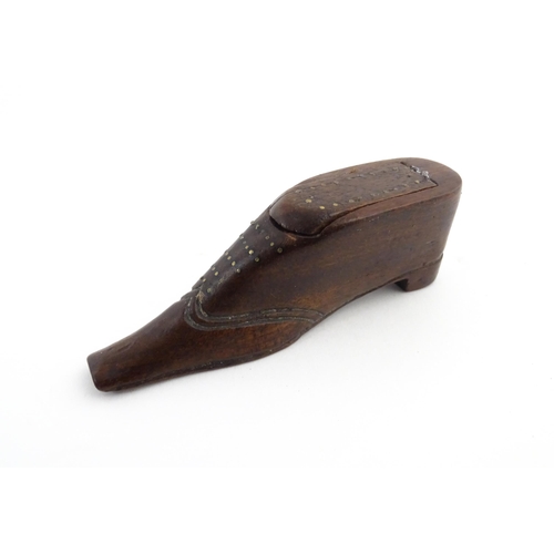 1208 - Treen : A 19thC shoe snuff box with sliding top and inlaid brass detail. Approx. 3