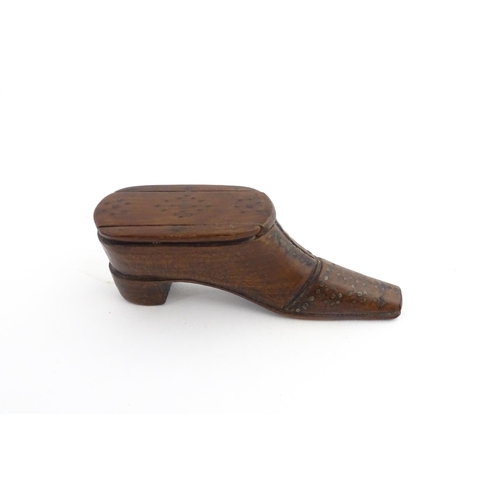 1209 - Treen : A 19thC shoe snuff box with sliding top and inlaid brass detail. Approx. 2 3/4